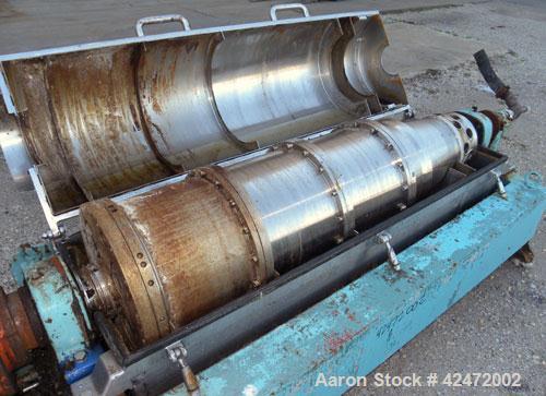 Used Alfa Laval FPNX-418B-31 Solid Bowl Decanter Centrifuge, 316 stainless steel construction (product contact areas), maximum bowl speed 3250 rpm, double row of lined cake discharge ports, 110 mm si...