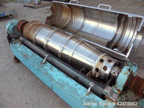 Used Alfa Laval FPNX-418B-31 Solid Bowl Decanter Centrifuge, 316 stainless steel construction (product contact areas), maximum bowl speed 3250 rpm, double row of lined cake discharge ports, 110 mm si...