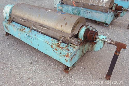 Used Alfa Laval decanter, type NX 418B-31G. 316 stainless steel construction on product contact parts. Approximate maximum bowl speed 4000. Single lead conveyor. Complete with gearbox.