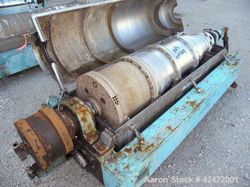 Used Alfa Laval decanter, type NX 418B-31G. 316 stainless steel construction on product contact parts. Approximate maximum bowl speed 4000. Single lead conveyor. Complete with gearbox.