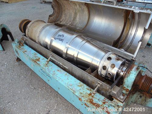 Used Alfa Laval decanter, type NX 418B-31G. 316 stainless steel construction on product contact parts. Approximate maximum bowl speed 4000. Single lead conveyor. Complete with gearbox.