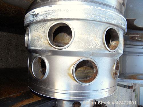 Used Alfa Laval decanter, type NX 418B-31G. 316 stainless steel construction on product contact parts. Approximate maximum bowl speed 4000. Single lead conveyor. Complete with gearbox.