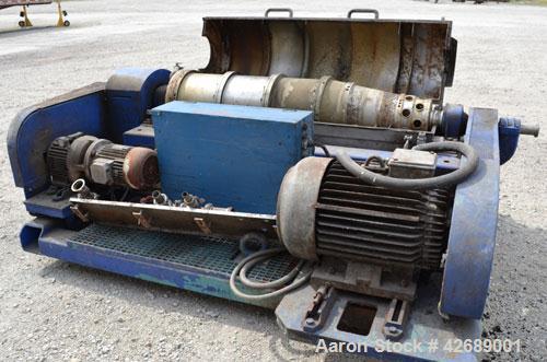 Used Alfa Laval NX-418-31 Solid Bowl Decanter Centrifuge. 316 Stainless steel construction on product contact parts. Max bowl speed 4000 rpm, 3 phase, 2 ¾" (70 mm) single lead conveyor with welded ha...