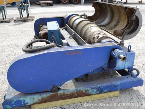 Used Alfa Laval NX-418-31 Solid Bowl Decanter Centrifuge. 316 Stainless steel construction on product contact parts. Max bowl speed 4000 rpm, 3 phase, 2 ¾" (70 mm) single lead conveyor with welded ha...
