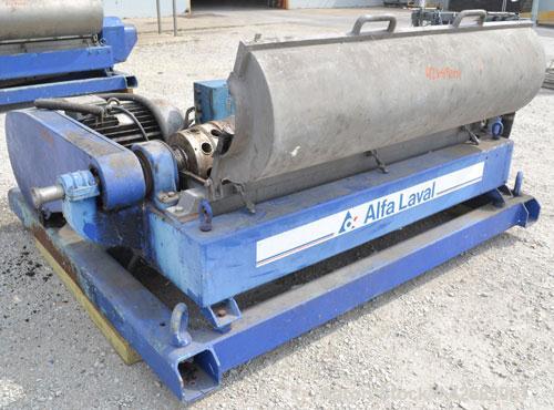 Used Alfa Laval NX-418-31 Solid Bowl Decanter Centrifuge. 316 Stainless steel construction on product contact parts. Max bowl speed 4000 rpm, 3 phase, 2 ¾" (70 mm) single lead conveyor with welded ha...