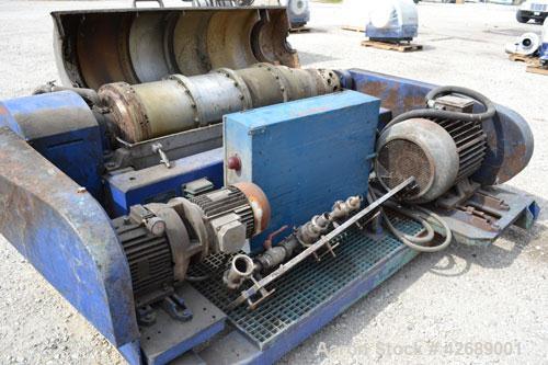 Used Alfa Laval NX-418-31 Solid Bowl Decanter Centrifuge. 316 Stainless steel construction on product contact parts. Max bowl speed 4000 rpm, 3 phase, 2 ¾" (70 mm) single lead conveyor with welded ha...