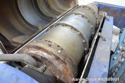 Used Alfa Laval NX-418-31 Solid Bowl Decanter Centrifuge. 316 Stainless steel construction on product contact parts. Max bowl speed 4000 rpm, 3 phase, 2 ¾" (70 mm) single lead conveyor with welded ha...