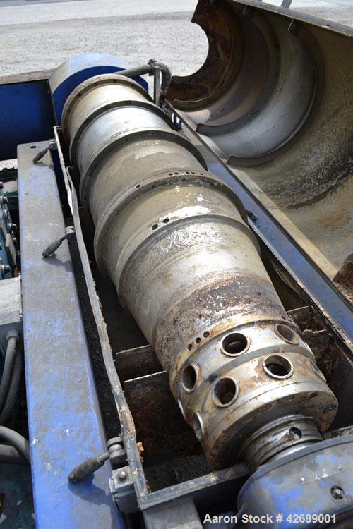 Used Alfa Laval NX-418-31 Solid Bowl Decanter Centrifuge. 316 Stainless steel construction on product contact parts. Max bowl speed 4000 rpm, 3 phase, 2 ¾" (70 mm) single lead conveyor with welded ha...