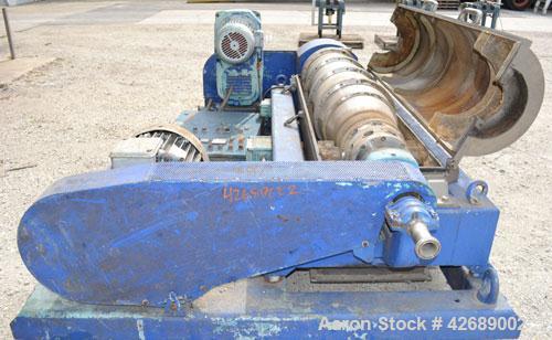 Used Alfa Laval NX-418S-31 Solid Bowl Decanter Centrifuge. 316 Stainless steel construction on product contact parts. Max bowl speed 4000 rpm, 3 phase, 2 ¾" (70 mm) single lead conveyor with welded h...