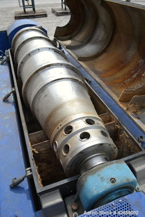 Used Alfa Laval NX-418S-31 Solid Bowl Decanter Centrifuge. 316 Stainless steel construction on product contact parts. Max bowl speed 4000 rpm, 3 phase, 2 ¾" (70 mm) single lead conveyor with welded h...