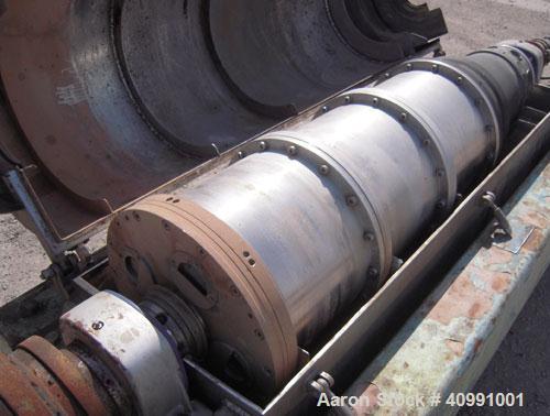 Used Alfa Laval NX-418B-31G Solid Bowl Decanter Centrifuge. 316 stainless steel construction on product contact areas, max bowl speed 4000 rpm. 70 mm single lead Esjberg conveyor with welded hardfaci...