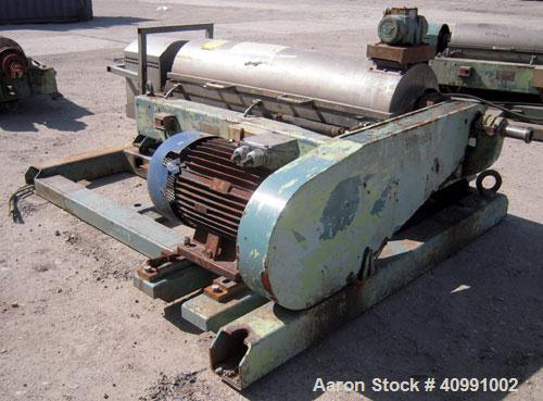 Used Alfa Laval NX-418B-31G Solid Bowl Decanter Centrifuge. 316 stainless steel construction on product contact areas, max bowl speed 4000 rpm. 70 mm single lead Esjberg conveyor with welded hardfaci...