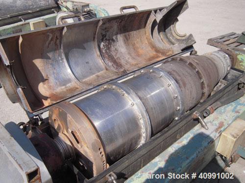Used Alfa Laval NX-418B-31G Solid Bowl Decanter Centrifuge. 316 stainless steel construction on product contact areas, max bowl speed 4000 rpm. 70 mm single lead Esjberg conveyor with welded hardfaci...