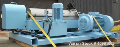 Used Alfa Laval NX-418B-31G Solid Bowl Decanter Centrifuge. 316 stainless steel construction on product contact areas, max bowl speed 4000 rpm. 70 mm single lead axial conveyor with welded hardfacing...
