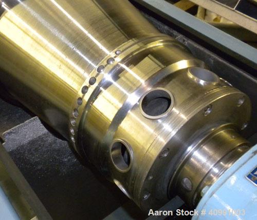 Used Alfa Laval NX-418B-31G Solid Bowl Decanter Centrifuge. 316 stainless steel construction on product contact areas, max bowl speed 4000 rpm. 70 mm single lead axial conveyor with welded hardfacing...