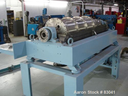 Used Alfa Laval NX-418B-31G Solid Bowl Decanter Centrifuge. 316 stainless steel construction on product contact areas. Maximum bowl speed 4000 rpm. 3" esjberg single lead conveyor with TM-21 welded h...