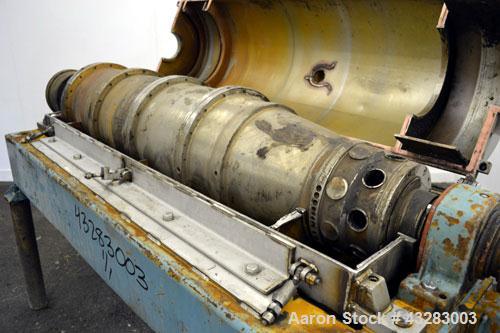 Used Alfa Laval NX-418 (2 or 3 phase) Solid Bowl Decanter Centrifuge. 316 Stainless steel construction (product contact areas), maximum bowl speed 3250 rpm, single row of lined cake discharge ports, ...