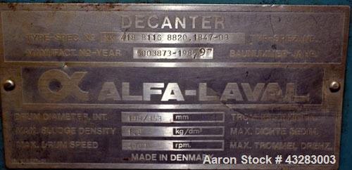 Used Alfa Laval NX-418 (2 or 3 phase) Solid Bowl Decanter Centrifuge. 316 Stainless steel construction (product contact areas), maximum bowl speed 3250 rpm, single row of lined cake discharge ports, ...
