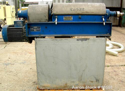 Used Alfa Laval NX-309S-31G Solid Bowl Decanter Centrifuge. Max bowl speed 5600 RPM, stainless steel construction on product contact areas, single lead conveyor, single row of cake discharge ports, b...