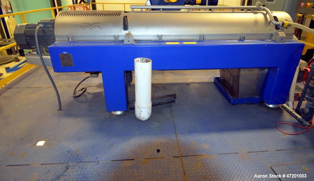 Used Alfa Laval NX3651B-31G Decanter Centrifuge. 316 Stainless steel product contact areas. Maximum bowl speed 4200 rpm, approximate 6" single lead conveyor, single row of lined cake discharge ports,...