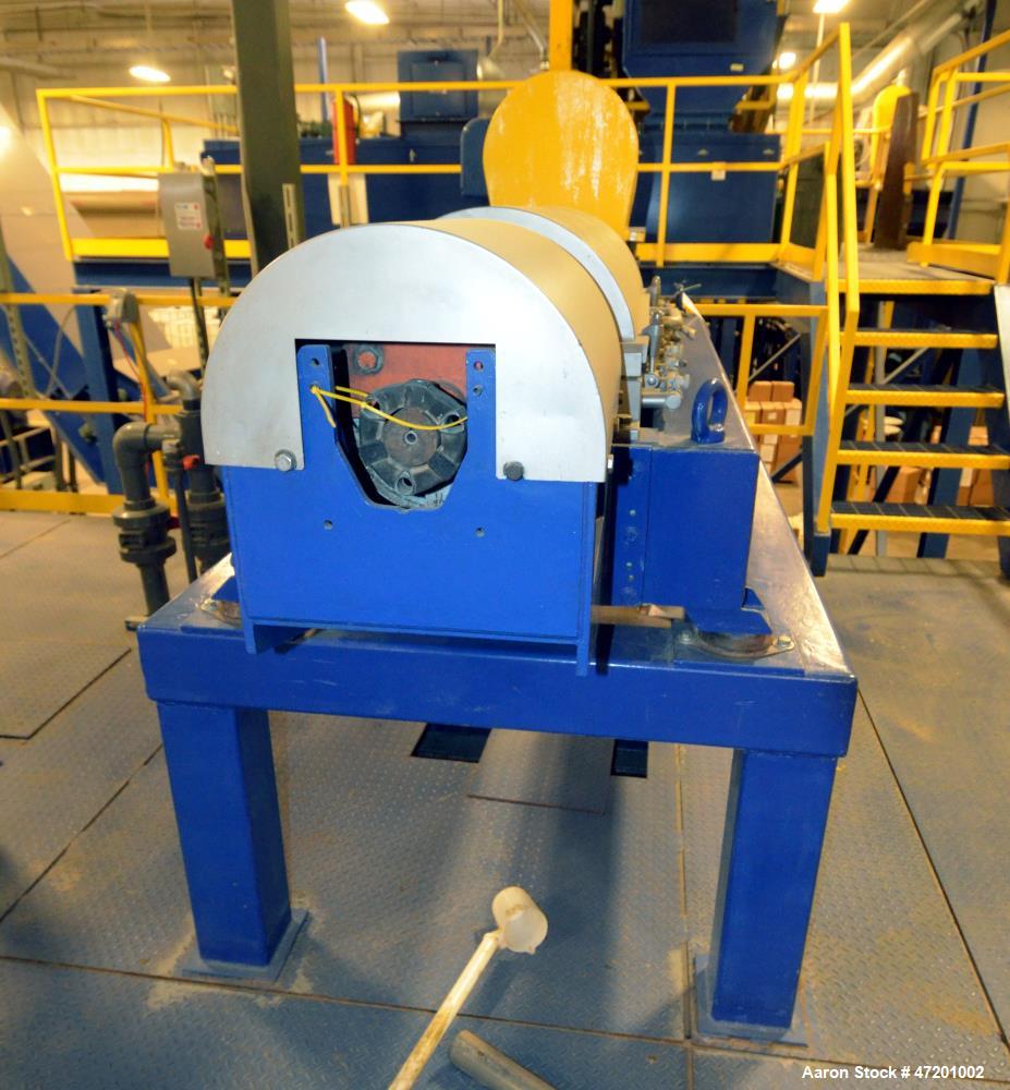 Used Alfa Laval NX 414 Decanter Centrifuge. 316 Stainless steel product contact areas. Maximum bowl speed 4000 rpm, approximate 110mm single lead conveyor, single row of lined cake discharge ports, 2...