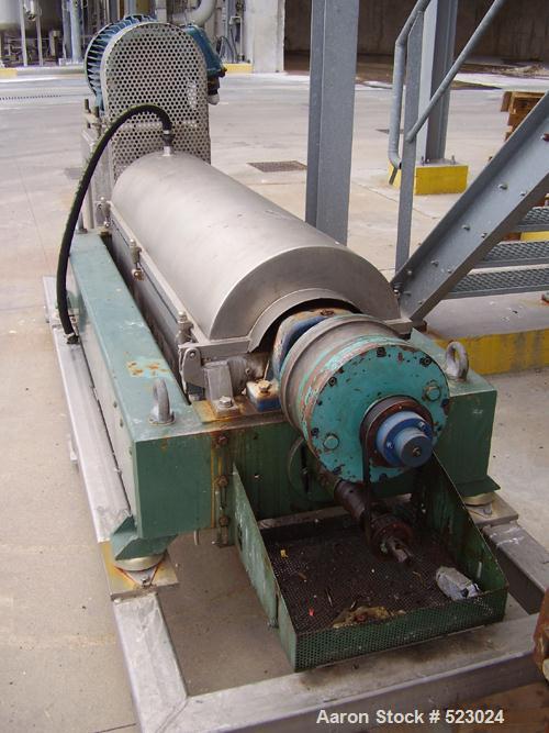 USED: Alfa Laval decanter, type NX418B-11G. 316 stainless steelconstruction on product contact parts. Max bowl speed 2250 rpm.70 mm single lead conveyor with welded hardfacing, double row oflined cak...