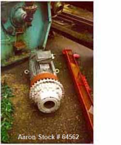 USED: Alfa Laval NX429B-31G Solid Bowl Decanter Centrifuge, material of construction is 316 stainless steel. Single row of cake discharge ports. Max bowl speed 2000 rpm by a 45 hp/30 kw-380-415/680 v...