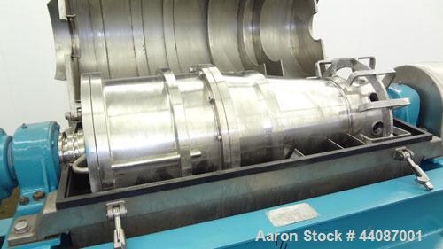 Used Alfa Laval UVNX-314B-11G Solid Bowl Decanter Centrifuge. 316 Stainless steel (product contact areas). approximate 70mm double lead conveyor, maximum bowl speed 3250 rpm, base, single row of line...