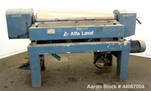 Used Alfa Laval UVNX-418 (2 or 3 phase) Solid Bowl Decanter Centrifuge. 316 Stainless steel (product contact areas). single lead conveyor, single row of lined cake discharge ports,cake discharge cage...