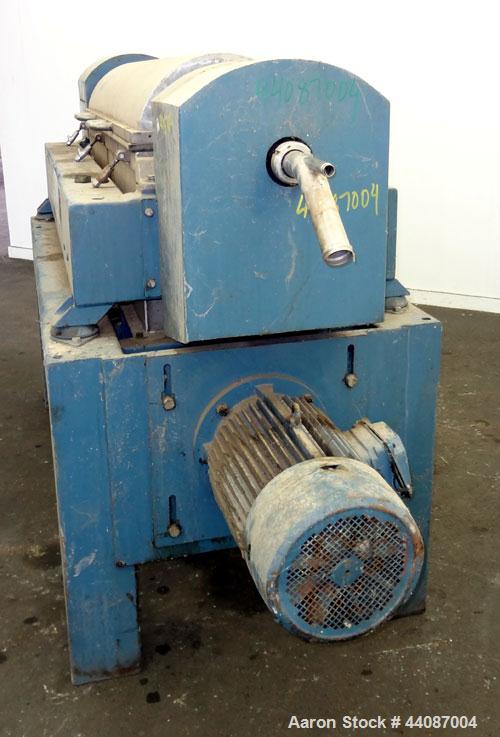 Used Alfa Laval UVNX-418 (2 or 3 phase) Solid Bowl Decanter Centrifuge. 316 Stainless steel (product contact areas). single lead conveyor, single row of lined cake discharge ports,cake discharge cage...