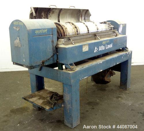 Used Alfa Laval UVNX-418 (2 or 3 phase) Solid Bowl Decanter Centrifuge. 316 Stainless steel (product contact areas). single lead conveyor, single row of lined cake discharge ports,cake discharge cage...