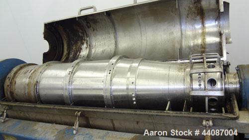 Used Alfa Laval UVNX-418 (2 or 3 phase) Solid Bowl Decanter Centrifuge. 316 Stainless steel (product contact areas). single lead conveyor, single row of lined cake discharge ports,cake discharge cage...