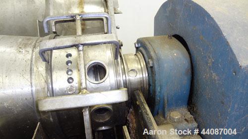 Used Alfa Laval UVNX-418 (2 or 3 phase) Solid Bowl Decanter Centrifuge. 316 Stainless steel (product contact areas). single lead conveyor, single row of lined cake discharge ports,cake discharge cage...