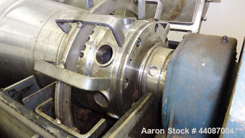 Used Alfa Laval UVNX-418 (2 or 3 phase) Solid Bowl Decanter Centrifuge. 316 Stainless steel (product contact areas). single lead conveyor, single row of lined cake discharge ports,cake discharge cage...