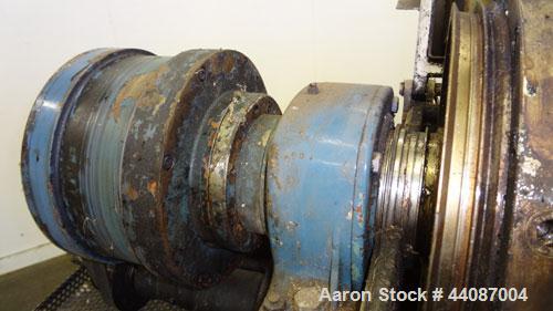 Used Alfa Laval UVNX-418 (2 or 3 phase) Solid Bowl Decanter Centrifuge. 316 Stainless steel (product contact areas). single lead conveyor, single row of lined cake discharge ports,cake discharge cage...