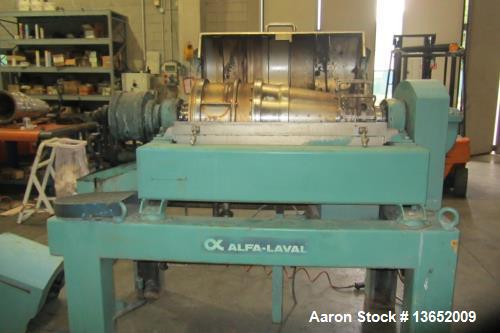 Used Alfa Laval UVNX-414B-31G Solid Bowl Decanter Centrifuge. 3 way, 316 stainless steel (product contact areas). Maximum bowl speed 3250 rpm, single lead conveyor, single row of line cake discharge ...