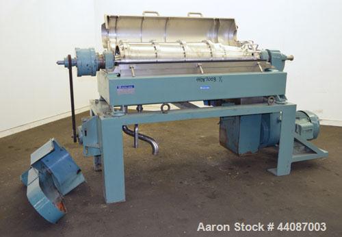 Used Alfa Laval UVNX-418 (2 or 3 phase) Solid Bowl Decanter Centrifuge. 316 Stainless steel (product contact areas). single lead conveyor, single row of lined cake discharge ports,  cake discharge ca...
