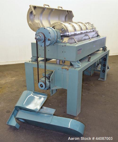 Used Alfa Laval UVNX-418 (2 or 3 phase) Solid Bowl Decanter Centrifuge. 316 Stainless steel (product contact areas). single lead conveyor, single row of lined cake discharge ports,  cake discharge ca...