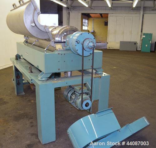 Used Alfa Laval UVNX-418 (2 or 3 phase) Solid Bowl Decanter Centrifuge. 316 Stainless steel (product contact areas). single lead conveyor, single row of lined cake discharge ports,  cake discharge ca...