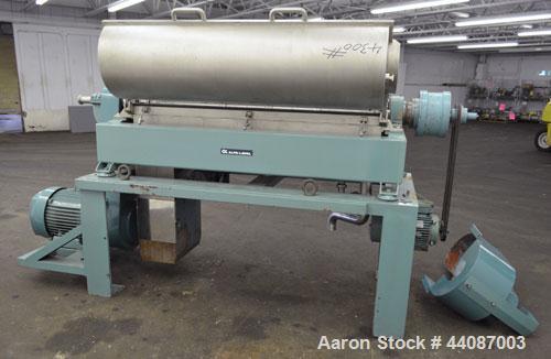 Used Alfa Laval UVNX-418 (2 or 3 phase) Solid Bowl Decanter Centrifuge. 316 Stainless steel (product contact areas). single lead conveyor, single row of lined cake discharge ports,  cake discharge ca...