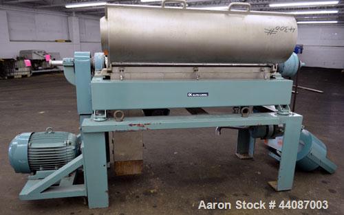 Used Alfa Laval UVNX-418 (2 or 3 phase) Solid Bowl Decanter Centrifuge. 316 Stainless steel (product contact areas). single lead conveyor, single row of lined cake discharge ports,  cake discharge ca...