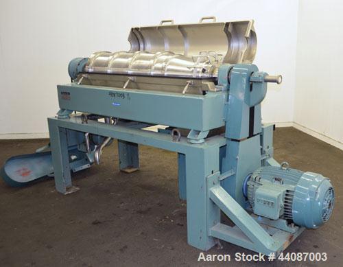 Used Alfa Laval UVNX-418 (2 or 3 phase) Solid Bowl Decanter Centrifuge. 316 Stainless steel (product contact areas). single lead conveyor, single row of lined cake discharge ports,  cake discharge ca...