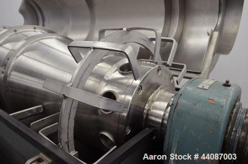 Used Alfa Laval UVNX-418 (2 or 3 phase) Solid Bowl Decanter Centrifuge. 316 Stainless steel (product contact areas). single lead conveyor, single row of lined cake discharge ports,  cake discharge ca...
