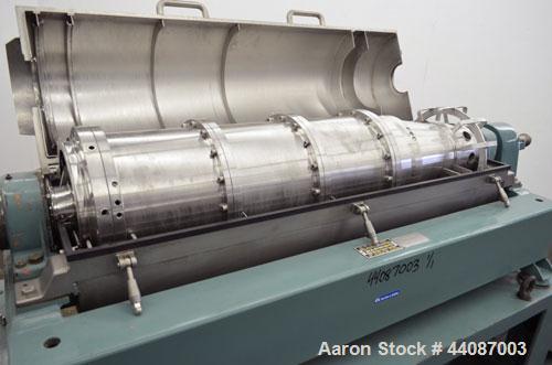 Used Alfa Laval UVNX-418 (2 or 3 phase) Solid Bowl Decanter Centrifuge. 316 Stainless steel (product contact areas). single lead conveyor, single row of lined cake discharge ports,  cake discharge ca...