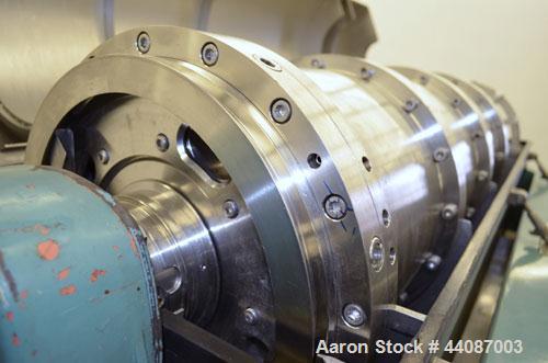 Used Alfa Laval UVNX-418 (2 or 3 phase) Solid Bowl Decanter Centrifuge. 316 Stainless steel (product contact areas). single lead conveyor, single row of lined cake discharge ports,  cake discharge ca...