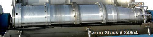 USED: Alfa Laval UVNX-418B-31G (2/3 phase) solid bowl decanter centrifuge. 316 stainless steel construction on product contact areas, max speed 4000 rpm, 3" single lead conveyor with welded hardfacin...