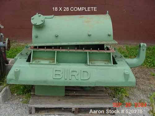USED: Bird 18" x 28" solid bowl decanter centrifuge, carbon steel construction. Max bowl speed 1800 rpm, cylinder bowl design, end solid discharge, 3" single lead conveyor, base, casing, feed pipe.