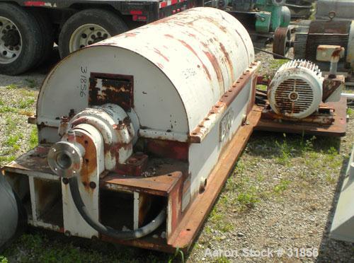 Used Bird HB-3700 Solid Bowl Decanter Centrifuge, Carbon Steel. Maximum bowl speed 1400 rpm, 8 degree contour bowl, 9" double lead conveyor with ceramic tiles. Driven by a 50 hp, 3/60/460 volt, 1750 ...