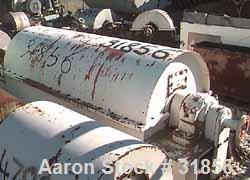 Used Bird HB-3700 Solid Bowl Decanter Centrifuge, Carbon Steel. Maximum bowl speed 1400 rpm, 8 degree contour bowl, 9" double lead conveyor with ceramic tiles. Driven by a 50 hp, 3/60/460 volt, 1750 ...