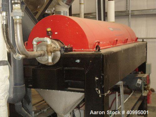 Used Centriquip CQ-5000 Solid Bowl Decanter Centrifuge, Includes electrical panel with PLC controls. Has less than 100 hours.
